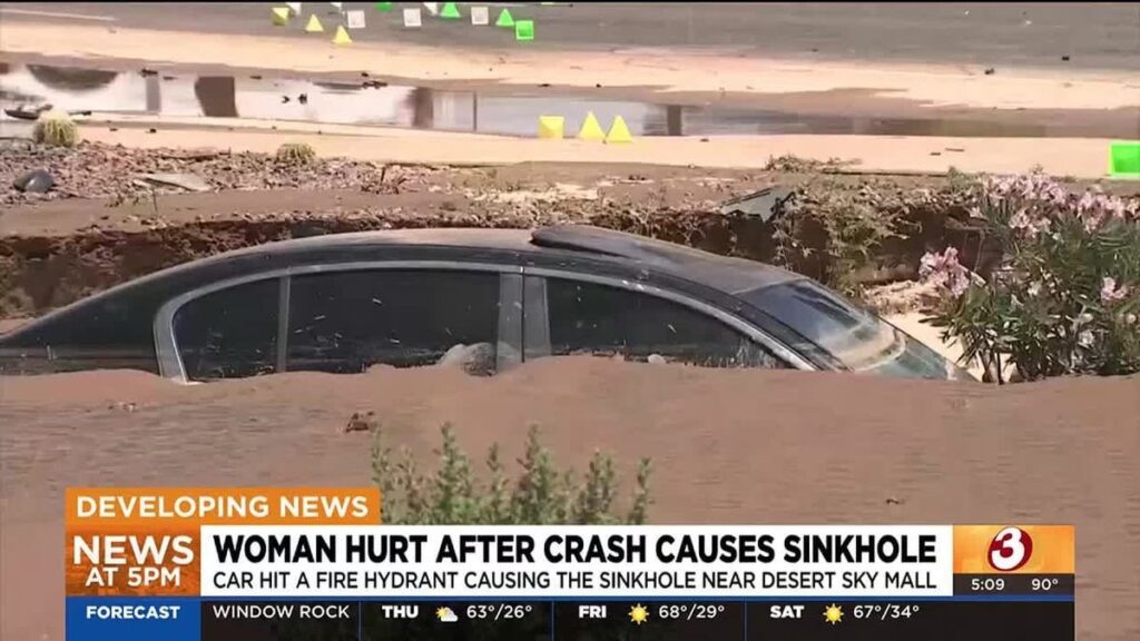 Car Swallowed By Sinkhole Created By Crash With Fire Hydrant And SUV