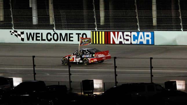 Tony Stewart, driver of the #14 Office Depot/Mobil 1 Chevrolet, celebrates after winning the NASCAR Sprint Cup Series Ford 400 and the 2011 Series Championship at Homestead-Miami Speedway on November 20, 2011 in Homestead, Florida.