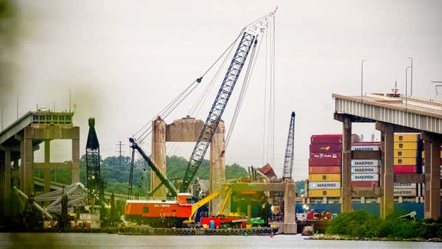 A photo of repair crews working on the Baltimore bridge. 