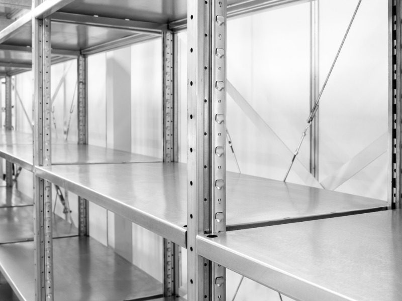 Empty auto parts warehouse shelves