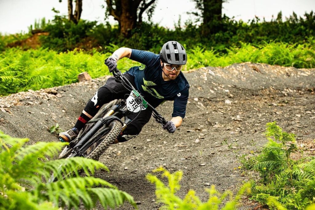 Mountain biker riding through corner