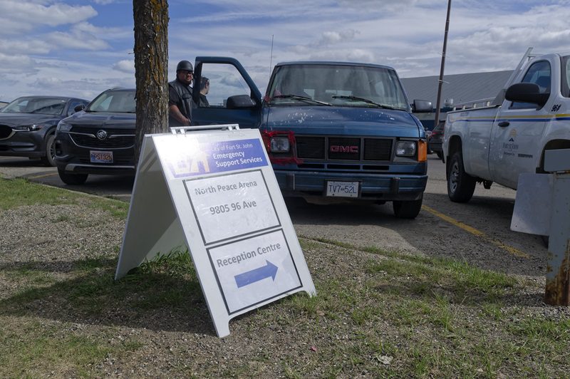 Evacuees to the Fort Nelson, B.C. wildfire gather at an arena in Fort St. John.