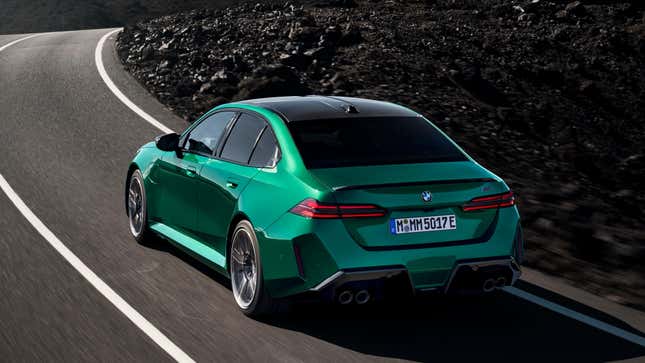 rear 3/4 shot of a green M5