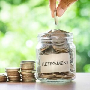 Jar labeled retirement filled with coins