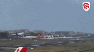 Two Planes Nearly Collide On Runway As One Lands While The Other is Still Taking Off