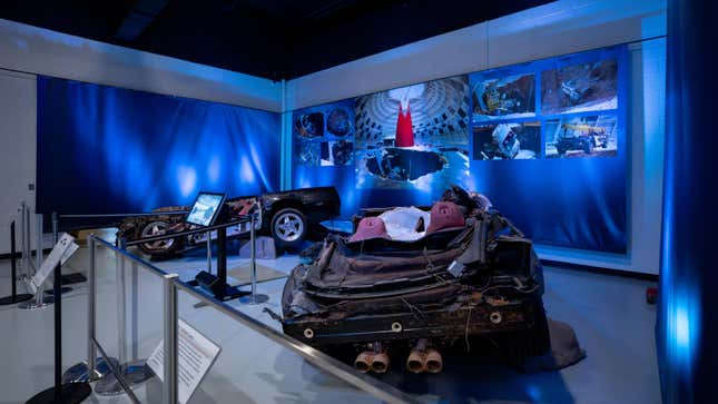 A photo of two of the smashed corvettes on display at the museum