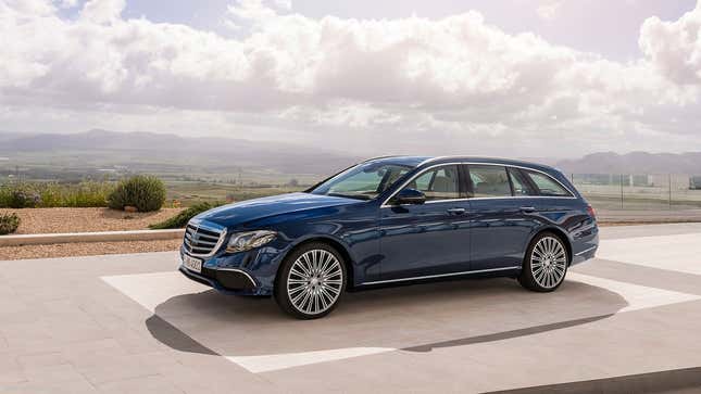 A photo of a blue Mercedes-Benz E-Class station wagon. 