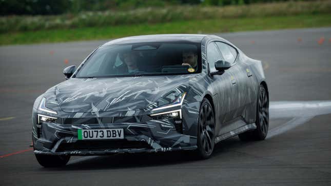 A photo of a Polestar 5 prototype on track. 