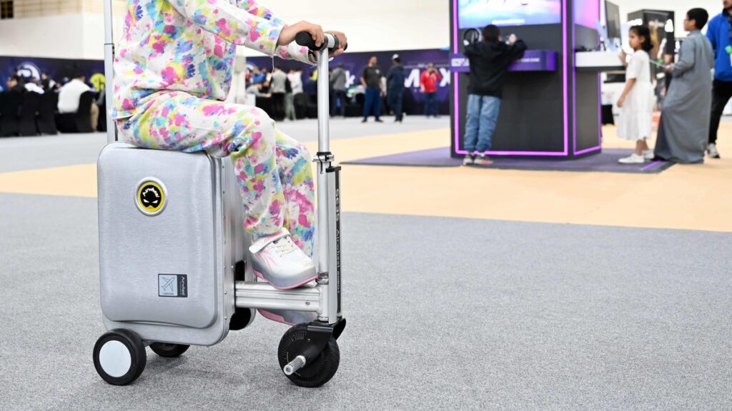 Japan Requires Electric Suitcase Riders To Have A Driver’s License And Wear A Helmet