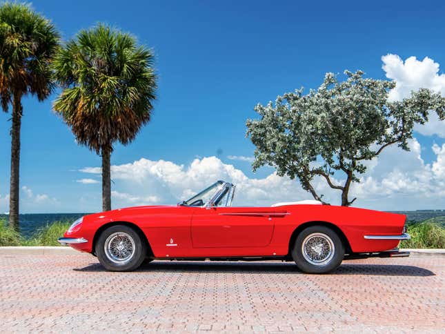 Side view of a red 1967 Ferrari 365 California Spyder