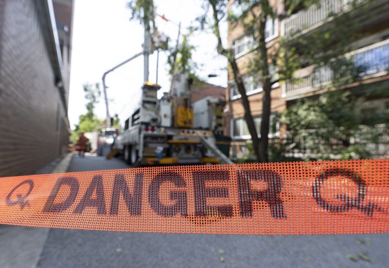 Two drivers arrested following a bus crash that caused a major power outage near Montreal