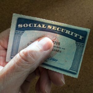 Person holding a social security card