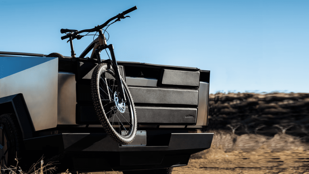 Tesla's New $300 Cybertruck Tailgate Pad Protects Your 'Bulletproof' Truck From Big Scary Bicycles