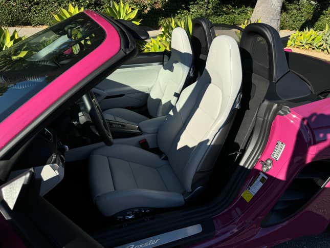 Front seats of a pink Porsche 718 Boxster Style Edition