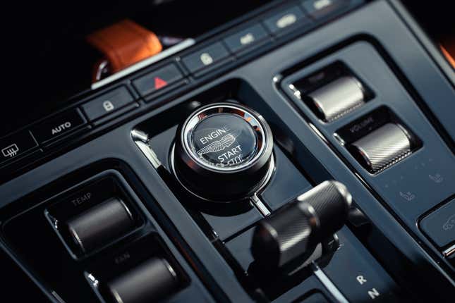 Start/stop button of an orange 2025 Aston Martin DBX707