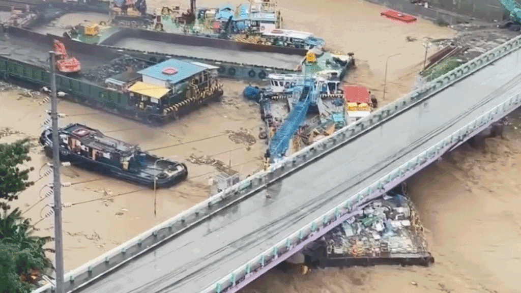 Watch Typhoon Storm Surge Slam Barges Into Bridge In The Philippines