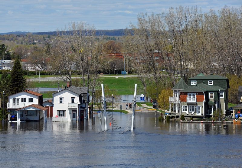 Gatineau, Canada - May 10, 2017: The severe flooding on Rue Jaques-Cartier along the Quebec side of the swollen Ottawa River. Pointe Gatineau is one of several areas in North America that has suffered flood conditions.