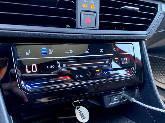 two photos of the GLI's new touch screen climate controls, one in daytime and one in the dark