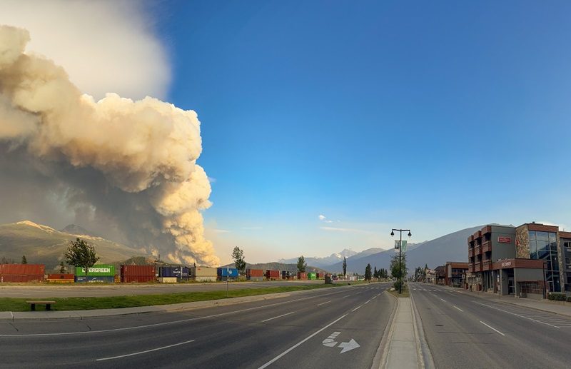 Photo Credit: A wildfire burns as an empty street in Jasper, Alta. is shown in this Wednesday, July 24, 2024 handout photo from the Jasper National Park Facebook page. THE CANADIAN PRESS/HO, Facebook, Jasper National Park 