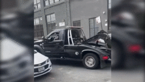 Driver Steals Truck Attempting To Tow His Pickup And Smashes Everything In His Path