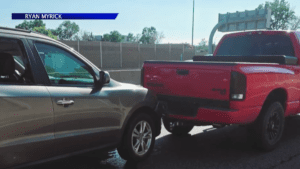 Driver Stops Out-Of-Control Car With His Dodge Ram On Highway