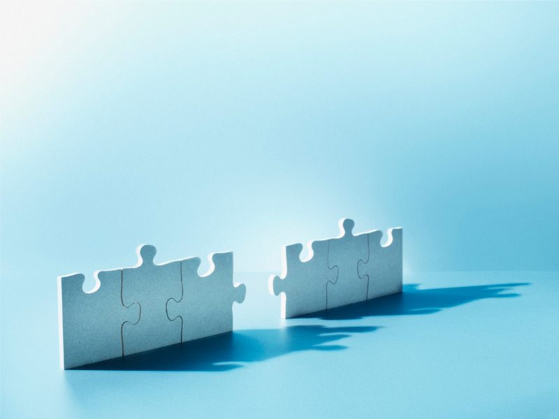 Jigsaw puzzle pieces - M&A concept