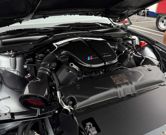 Engine bay of the silver BMW 858 CSL