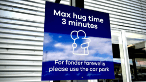 Airport Imposes Hug Time Limit, Suggests Moving PDA To Parking Lot