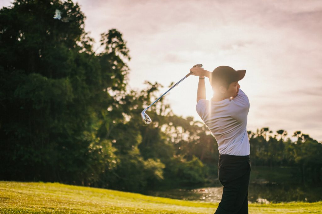 how to stop topping the golf ball