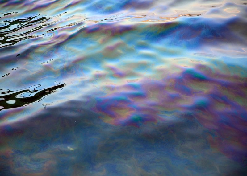 An oil spill in open water.