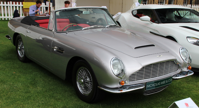 Aston Martin DB6 Volante parked outside 