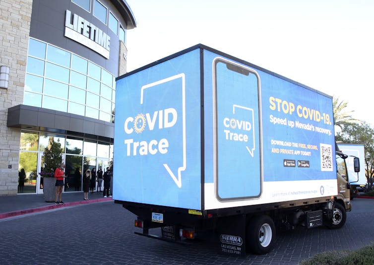 truck advertising 'COVID Trace' app