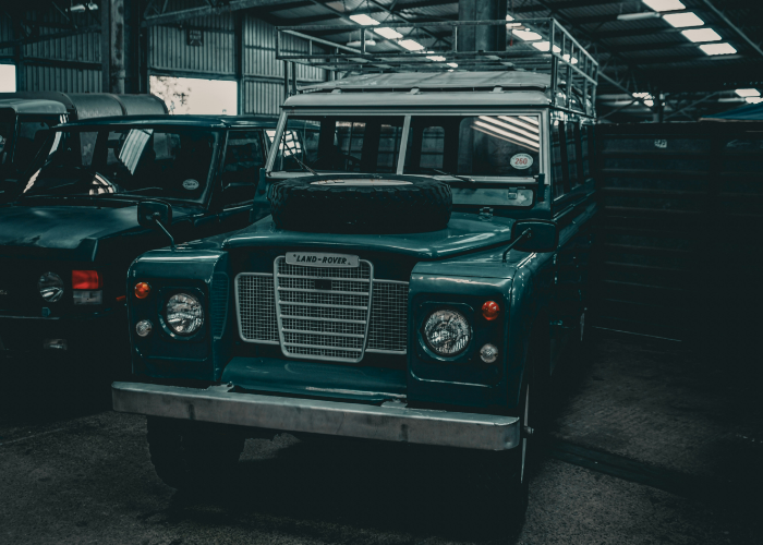 Land Rover Series 3 Station Wagon parked in a garage