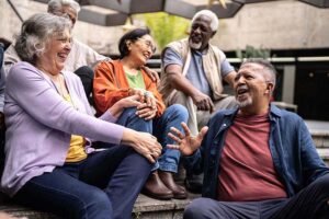 Senior friends talking outdoors