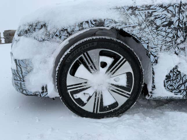 Front wheel of a camouflaged Mercedes-Benz CLA EV prototype