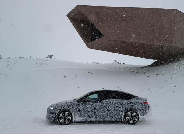 Side view of a camouflaged Mercedes-Benz CLA EV prototype