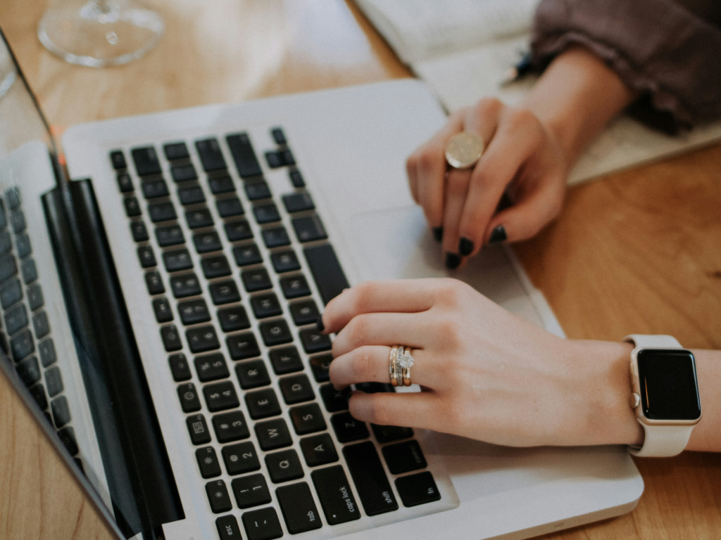 Young woman's hands on a laptop