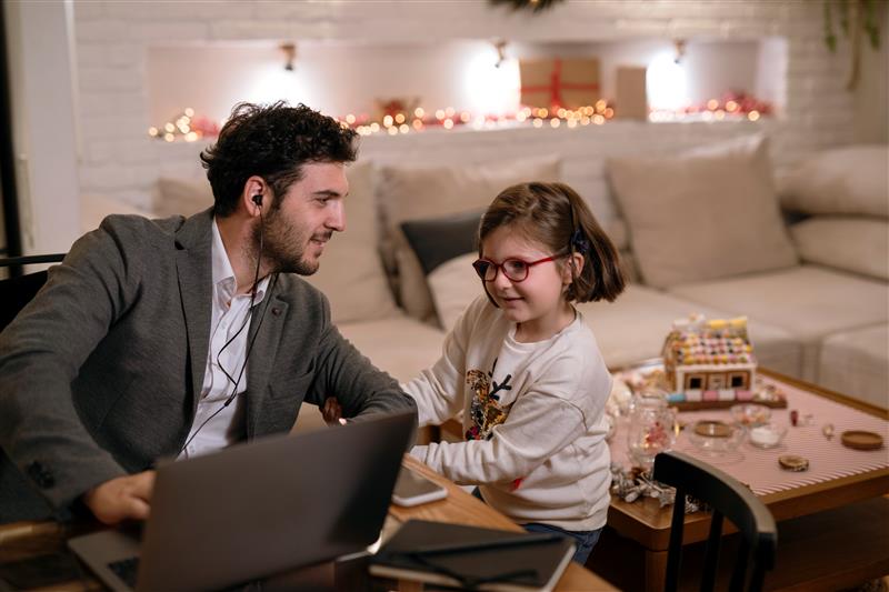 Father and daughter enjoying Christmas