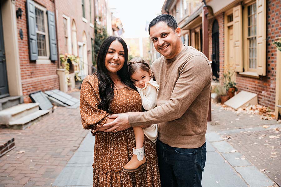 The Delgado family, smiling in Elfreth's Alley