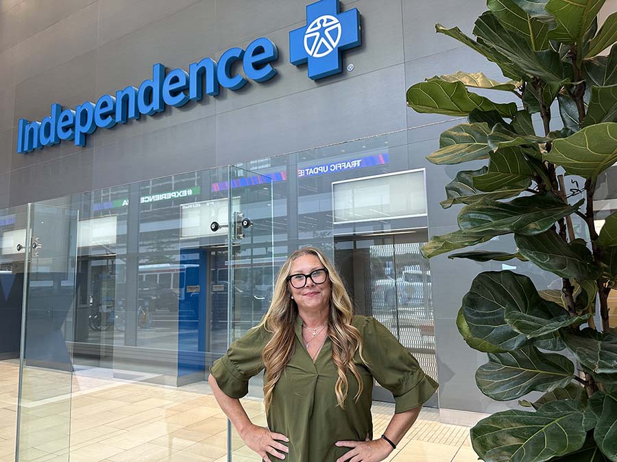 Melissa Mocharnuk, standing in the lobby of the IBX headquarters